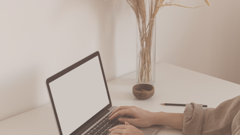 woman at a laptop computer on a desk